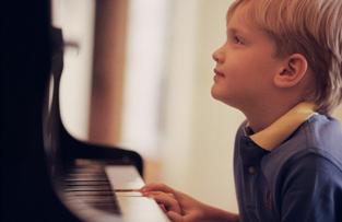 Young Kid Playing Piano